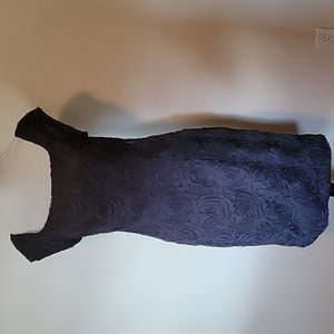 Evening dress with tuples floral design. Jessica Howard. Size 10, zip back